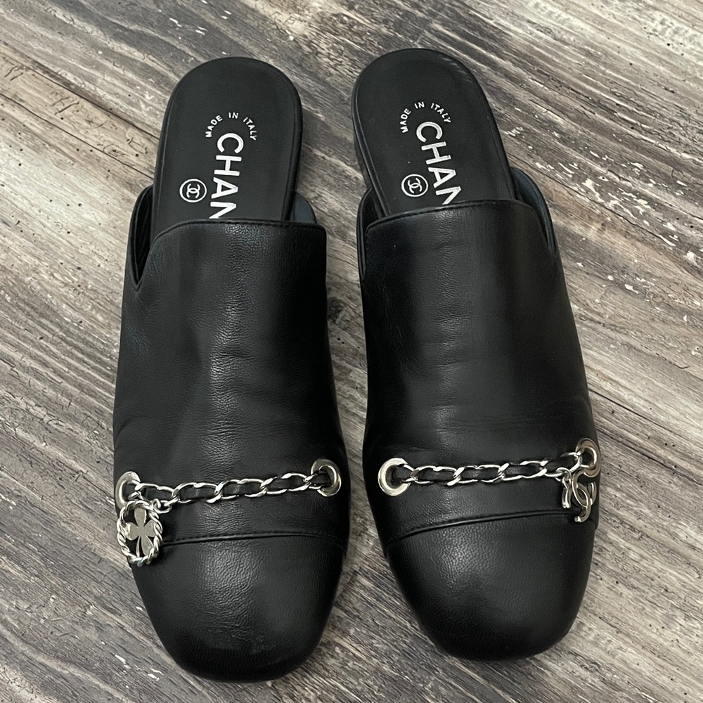 CHANEL Black Mules with Silver Chain Accent